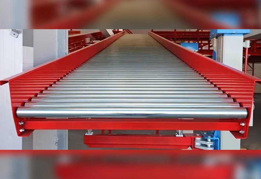 Gravity conveyor roller in a distribution center